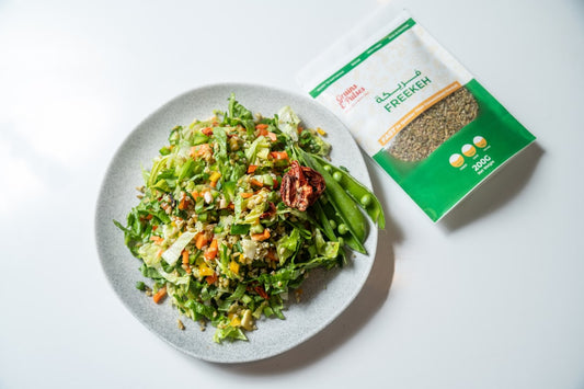 Fresh lettuce wraps filled with microgreen chicken salad on white plate