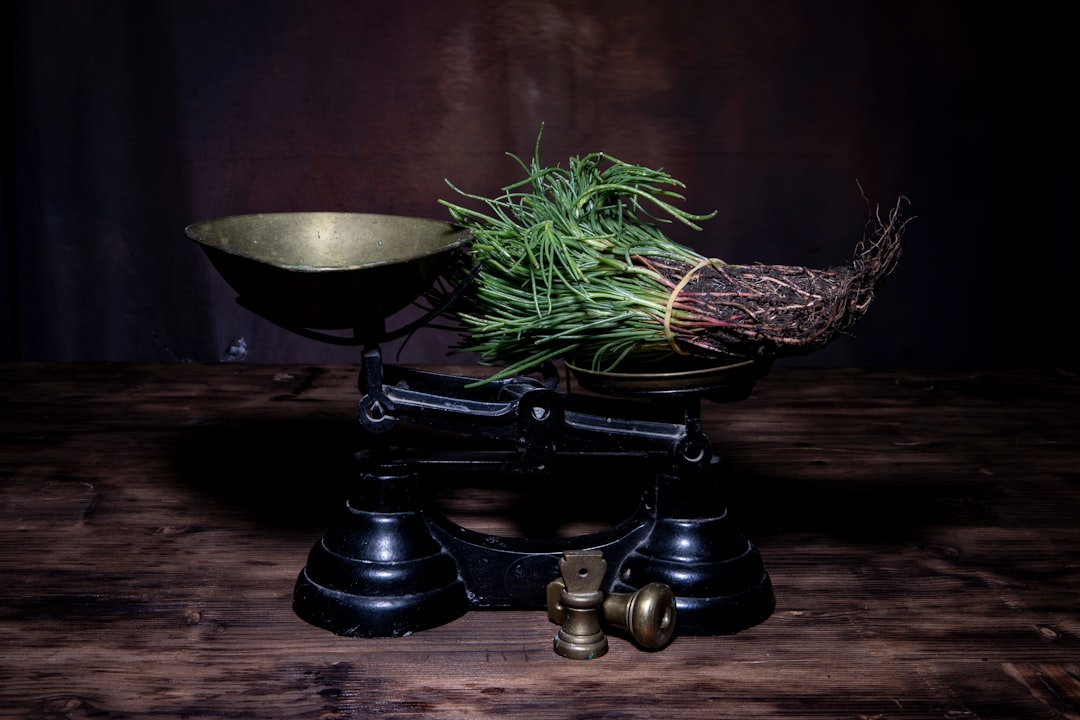 Golden poached egg on avocado toast topped with fresh pea shoot microgreens