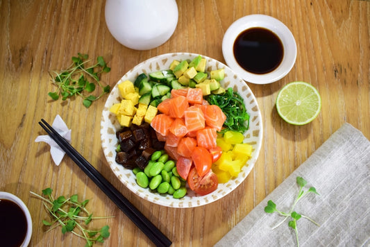 Colorful microgreen tacos topped with cilantro lime crema on rustic wooden board