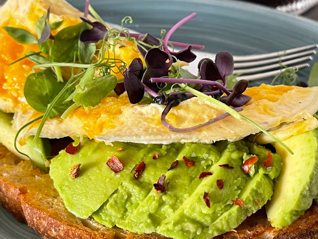 Avocado toast with egg and microgreens